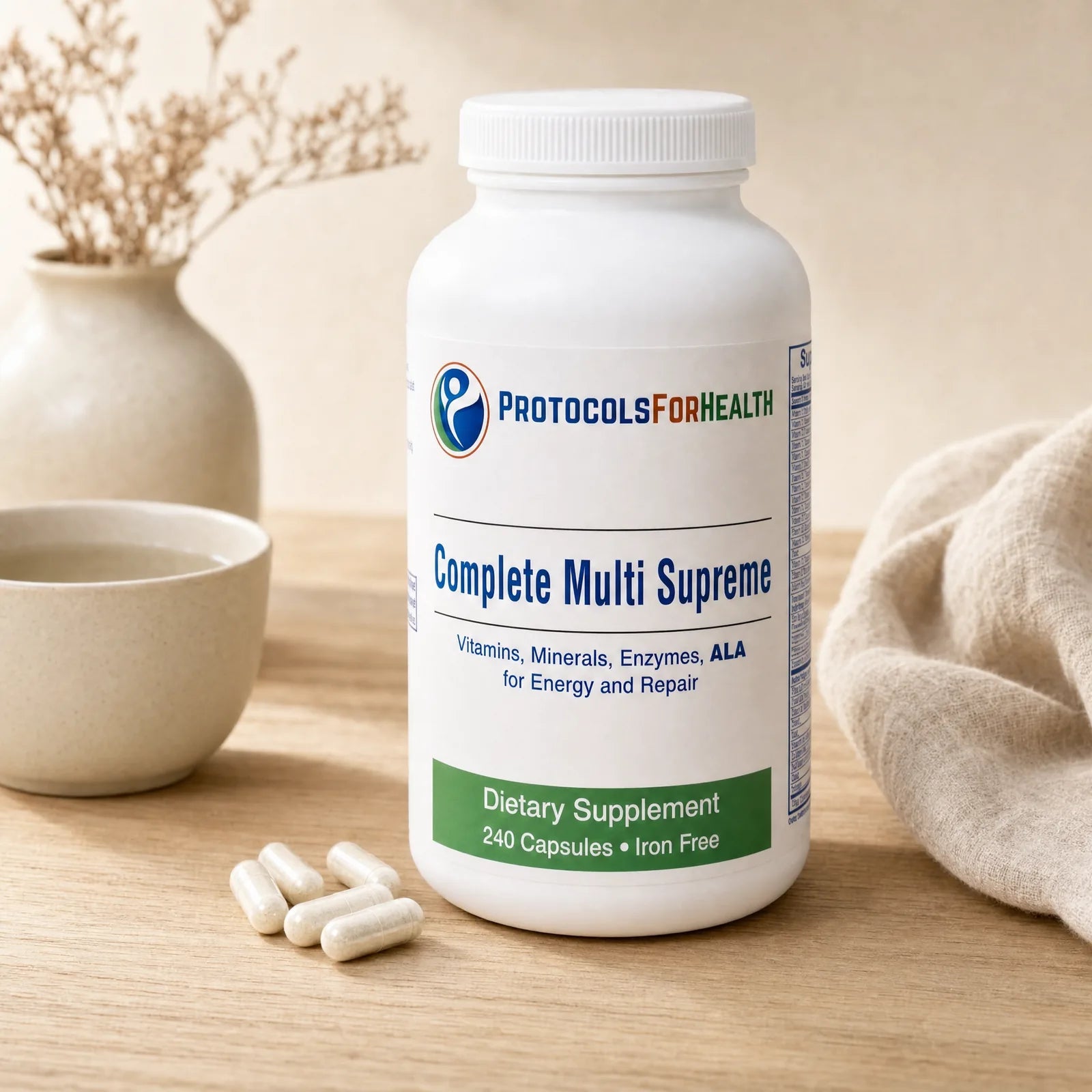 Complete Multi Supreme bottle in a morning kitchen setting with capsules and linen